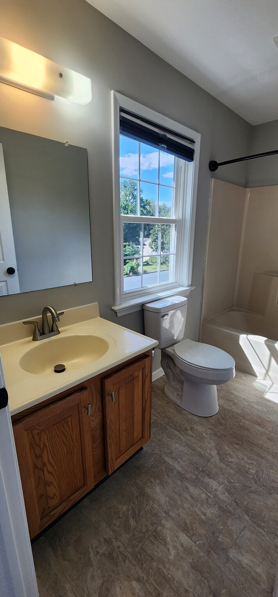 Master bathroom with new toilet and pull down faucet - 30 Edgewood Dr