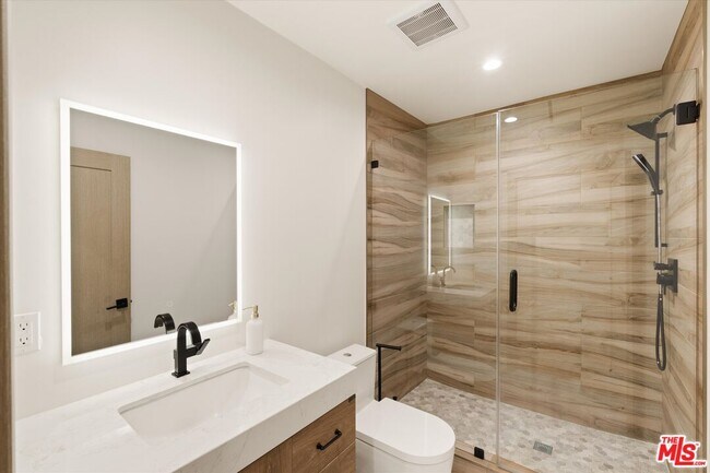 Building Photo - 11700 Woodley Ave