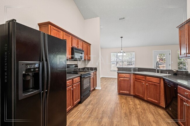 Building Photo - Beautiful 4-Bed 2-Bath Home on Corner Lot in Gated Community