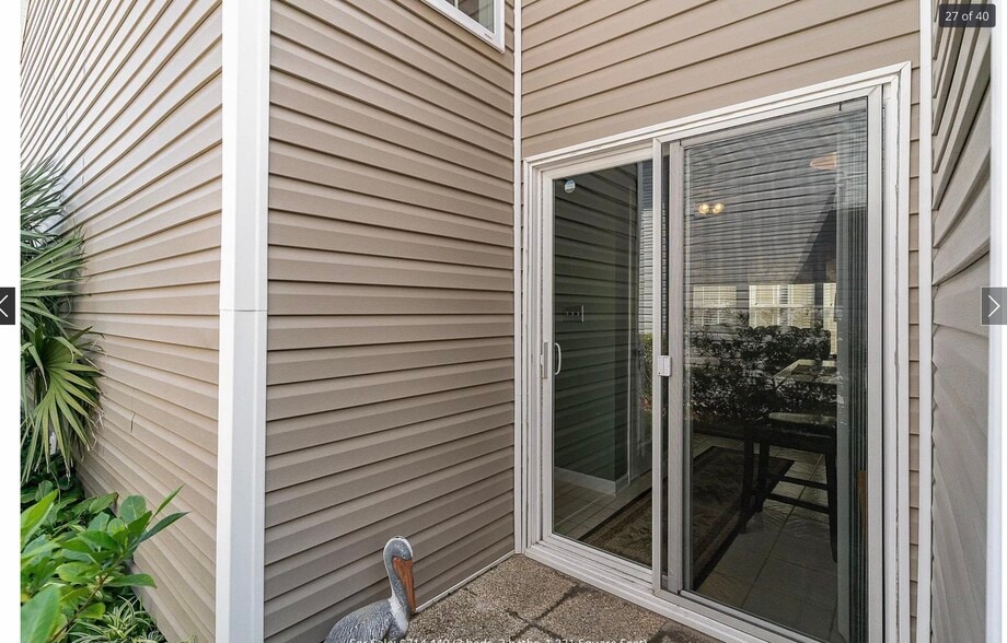 Back patio space for a grill - 203 Lyons Cove Dr