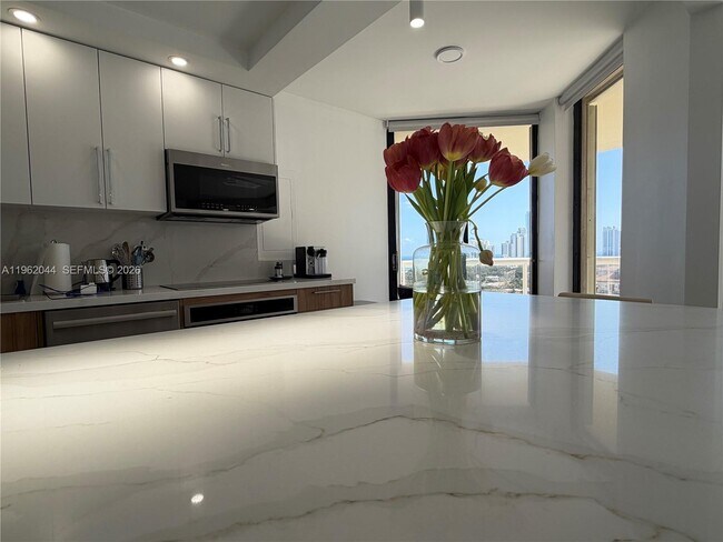 Building Photo - 20191 E Country Club Dr