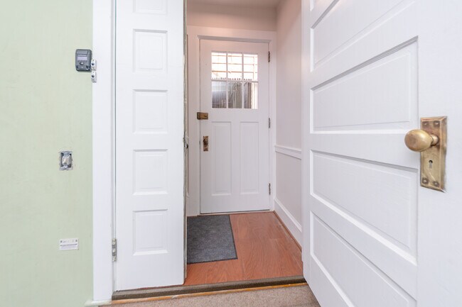 Front door from inside garage - 206 E Marion St