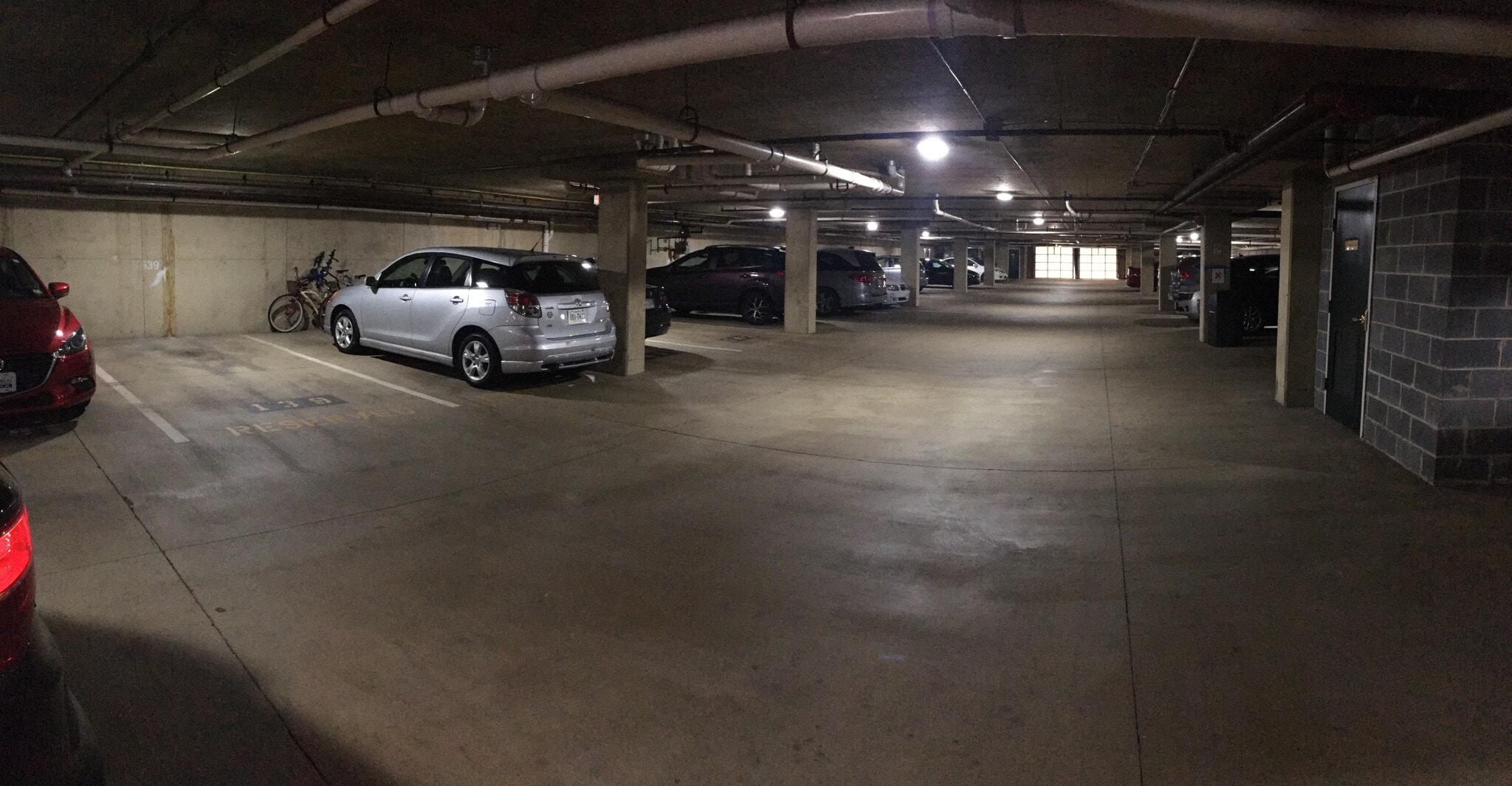 garage parking spot (directly across from elevator) - 1591 Spring Gate Dr