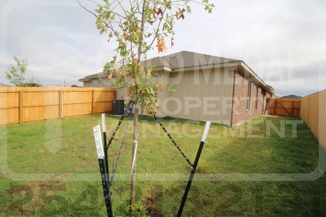 Building Photo - 5103-5105 Red Rose Crossing