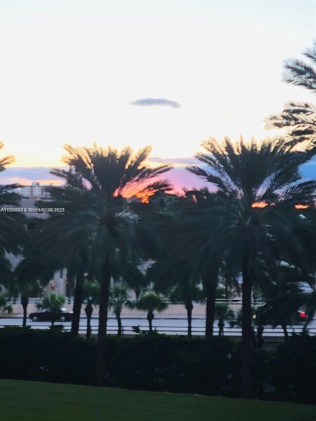 Building Photo - 10275 Collins Ave