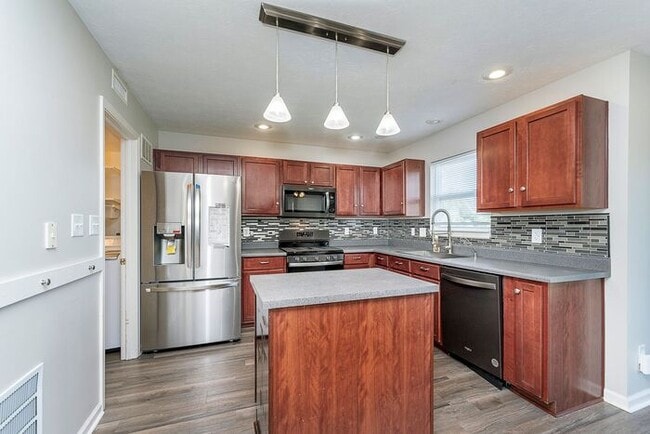Building Photo - 4 Bedroom Home With Pond View in Top Rated...