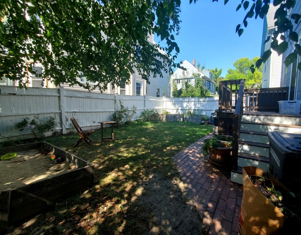 Back yard. NOTE: Now even sunnier. Birch tree and sandbox since removed. - 59 Cameron Ave