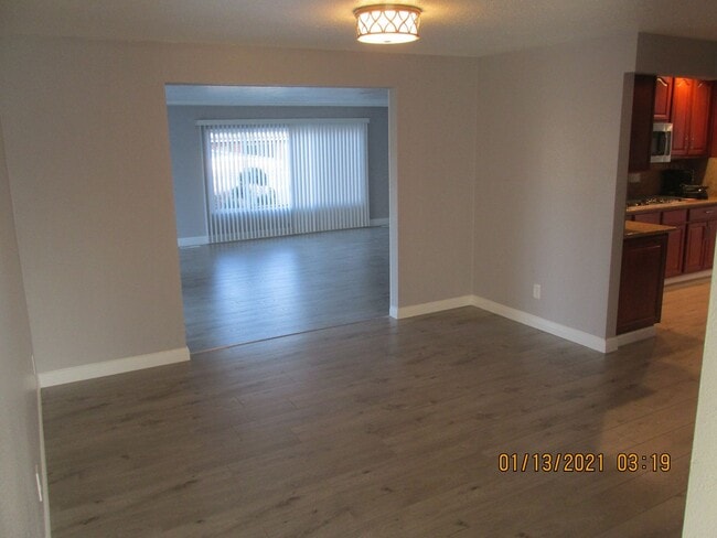 Building Photo - Remodeled !  Hardwood Flooring Throughout & New Carpet in Bedrooms, Tile, Granite, Large Living r...