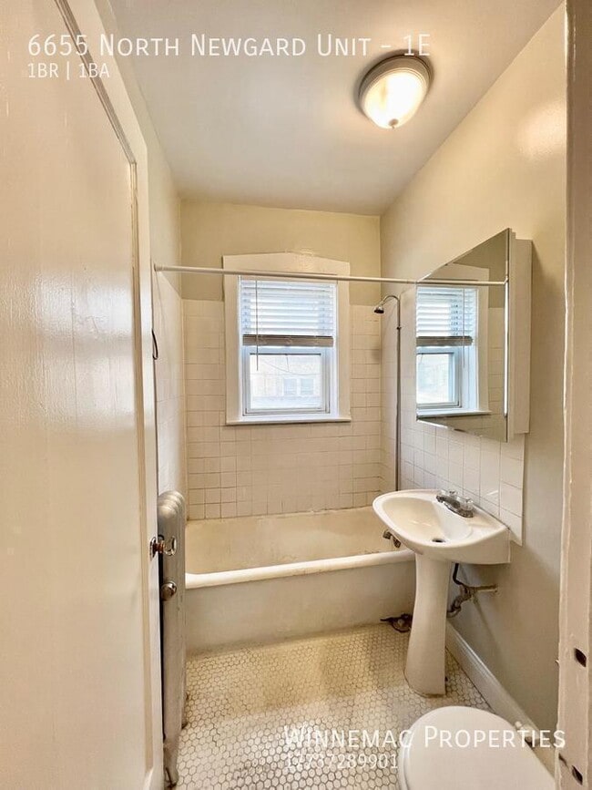 Building Photo - 6655 N Newgard Ave