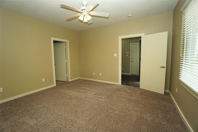 Building Photo - Elegant Gated Townhome Offering Unparallel...