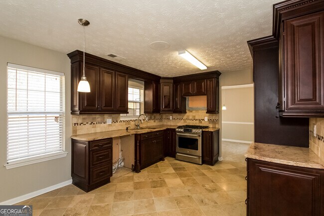 Building Photo - 6650 Etterlee Dr