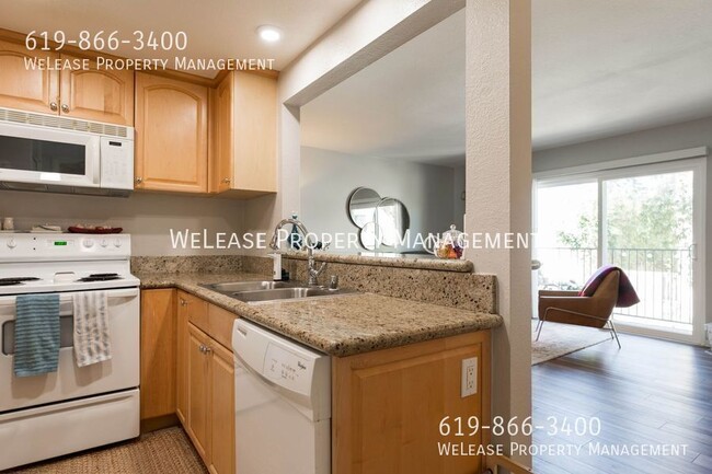 Building Photo - 2 bed 1 bath Sunny top floor end unit in G...