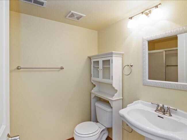 Building Photo - June Rent Free!!  Move Today!  Four Bedroom, Three Bath Home with Beautiful Backyard, Two Car Gar...