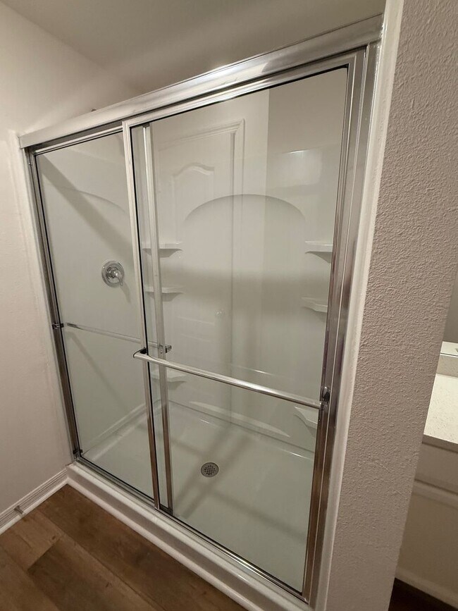 Building Photo - Stunning Brand-New 3 Bedroom + Den with Fe...