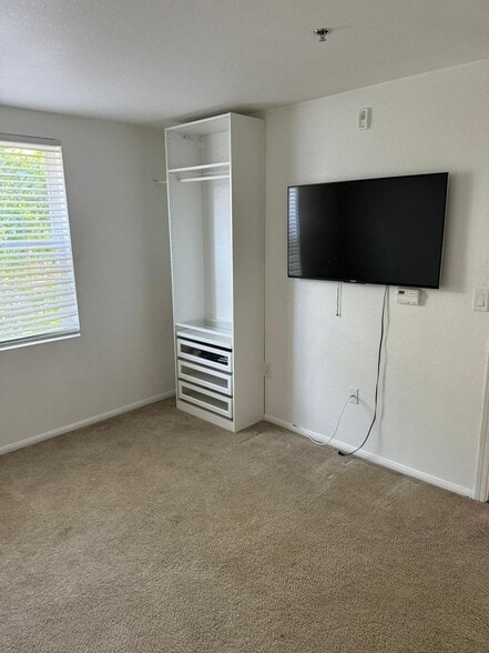Second Bedroom ( has an additional closet in addition to storage unit shown in this photo ) - 1970 Columbia St