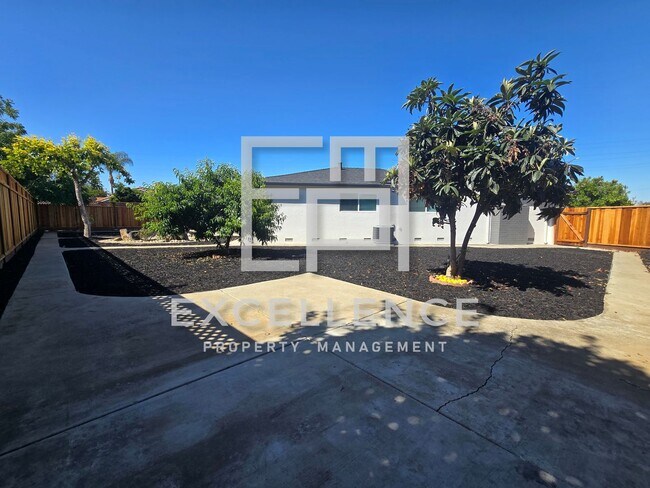 Building Photo - All Newly Remodeled Throughout Home With Huge Yard