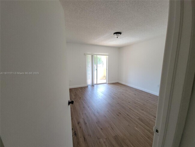 Building Photo - 6965 NW 173rd Dr