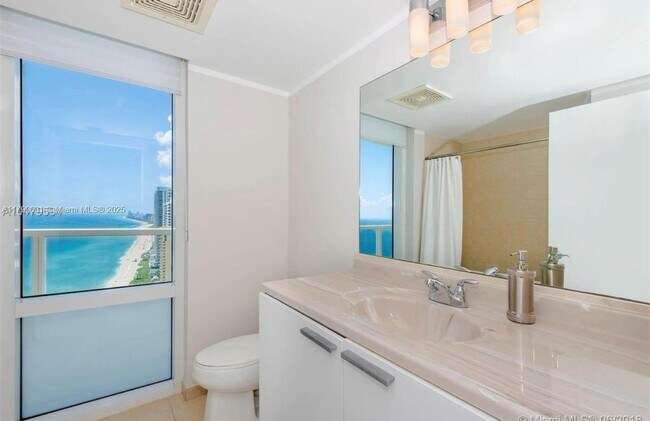 Building Photo - 16699 Collins Ave