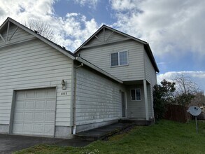 Building Photo - Three Bedroom Duplex