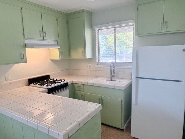 Building Photo - 5803 Woodleigh Dr