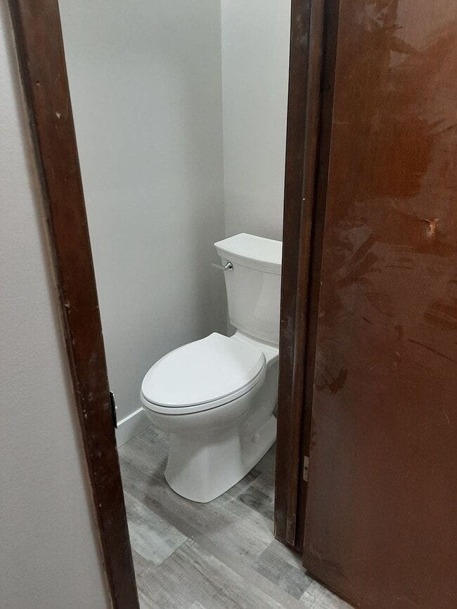 Building Photo - Updated 2BR/1.5BA with garage, lawn care included