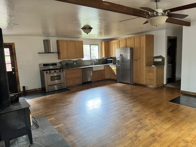 Kitchen with gas stove, dishwasher and new Fridge - 12172 Rainbow Dr