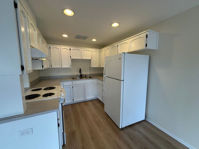 Building Photo - Shopper's Delight- Central Vancouver 2/ 2.5 Townhouse