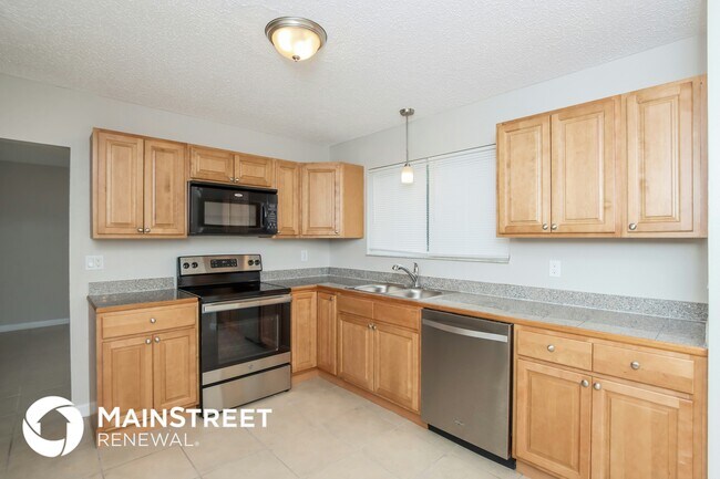 Building Photo - 1320 Mann Ave NW