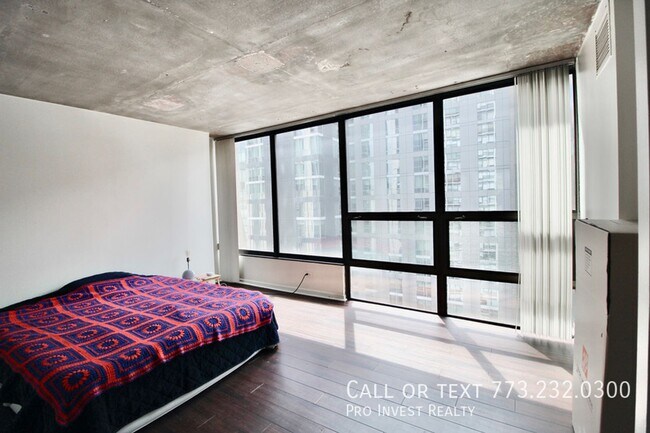 Building Photo - Available July 1st! Sun-filled Oversized 1...