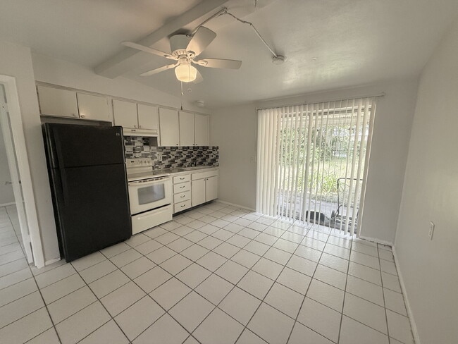Building Photo - "Charming 1-Bedroom Duplex Retreat on Carn...