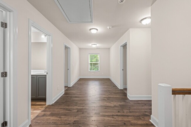 Building Photo - Spacious 4-Bedroom Retreat with 2.5 Baths ...