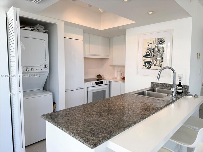 Building Photo - 8911 Collins Ave