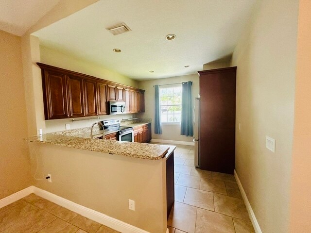 Building Photo - 6804 N Himes Ave