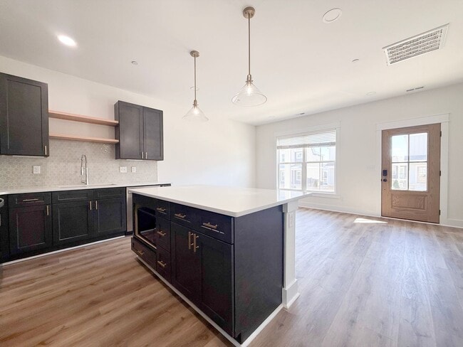 Building Photo - Fuller Style - Spacious 2-Bedroom Townhome with Flex Room at Highbury