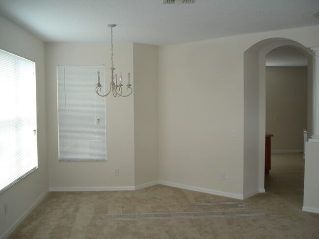 Building Photo - Eagle Creek at Lake Nona. 4/2.5 with Conservation View. Lawn Care Included with Rent!!