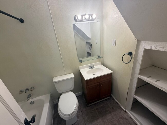 Building Photo - Cutest 2-bedroom cottage with a loft! Huge shady backyard for all things outdoor! All Brand new a...