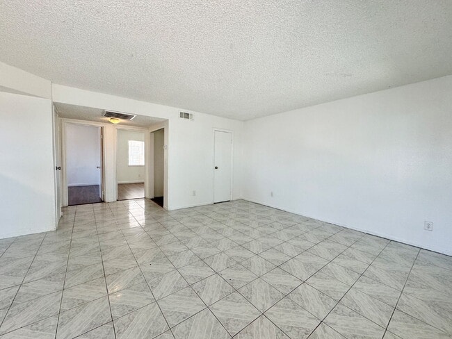 Building Photo - DOWNSTAIRS CONDO | RECENLY REHABBED 2 BEDROOM 1 BATH | ACROSS FROM CSN CHEYENNE