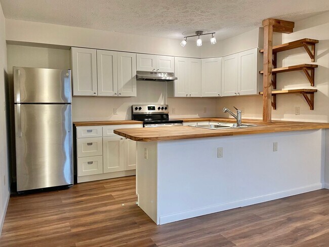 Building Photo - Renovated Quadplex unit in rural setting close to exit 113