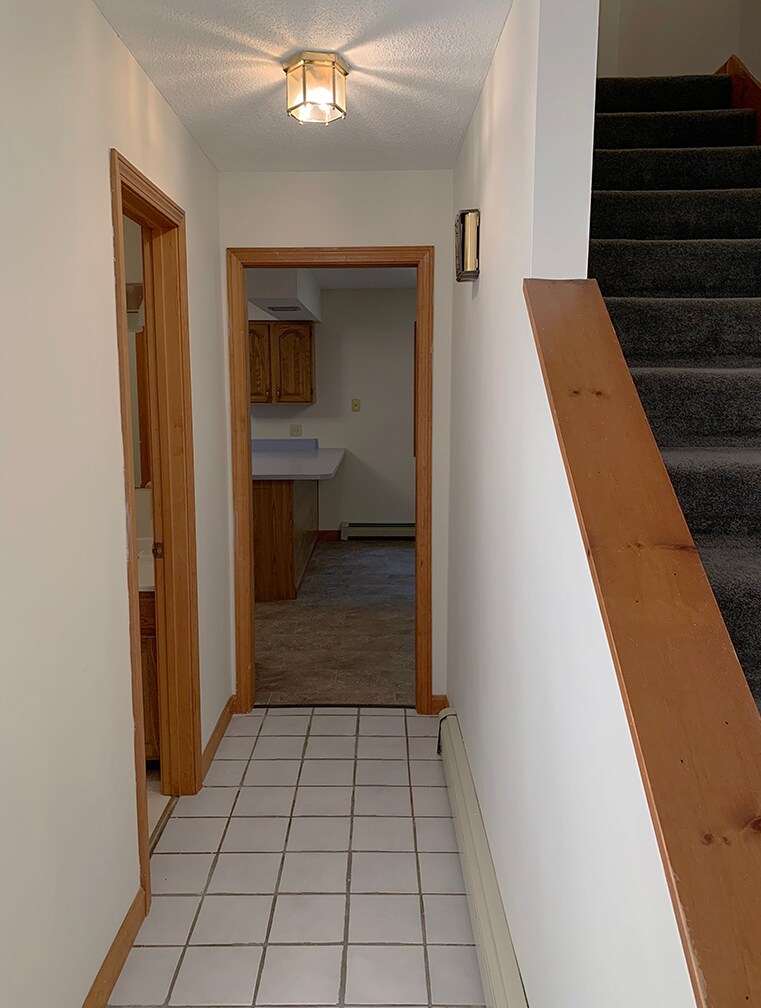 Front Door Hallway to Kitchen/Stairs/.5 bath - 146 Fern Rd
