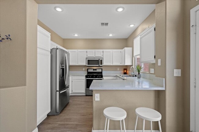 Building Photo - Stylish Single-Story 3-Bedroom Partially Furnished Home Designer Kitchen & Private Backyard Oasis