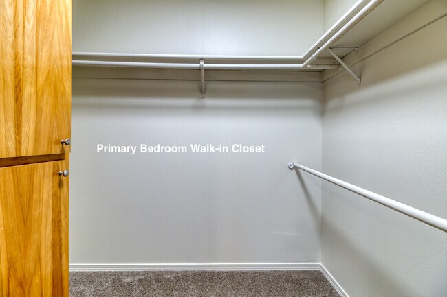 Primary Bedroom Walk-in Closet - 1923 NE Derek Dr
