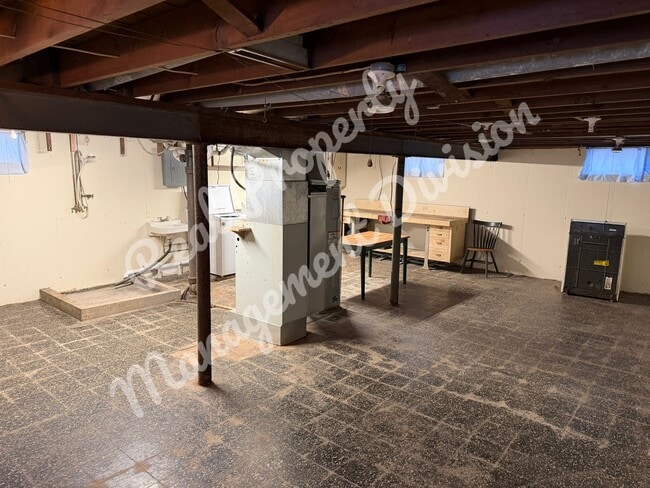 Building Photo - **Charming 2-Bed, 1-Bath Home with Retro Flair + Garage & Yard**