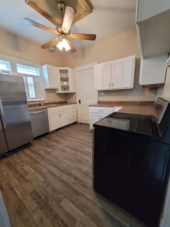 Kitchen- new laminate flooring - 1545 S 13th St