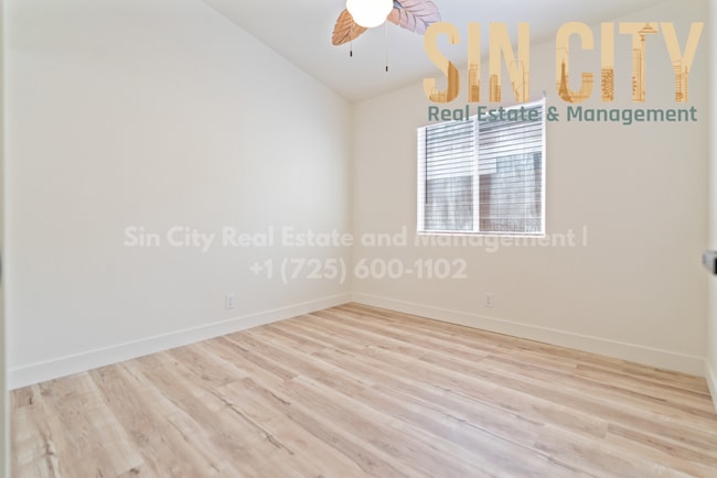 Building Photo - "Charming 3-Bed Oasis with Granite Touches & Cozy Fireplace in Las Vegas"