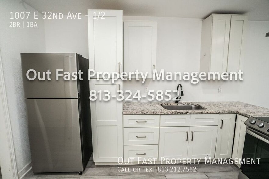 Building Photo - 1007 E 32nd Ave