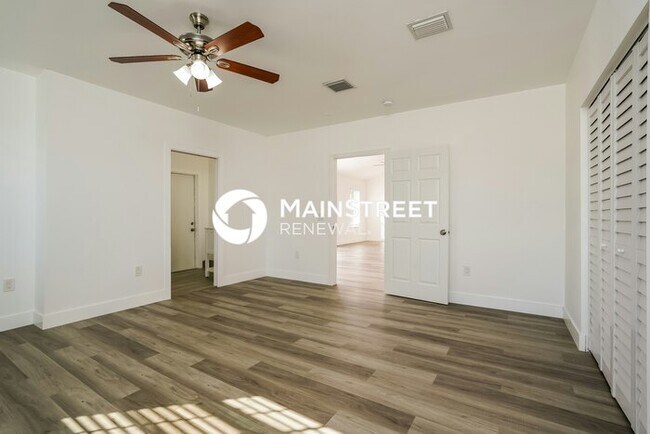 Building Photo - 4 Bedroom Pet-Friendly Home in LEHIGH ACRES, FL with Main Street Renewal
