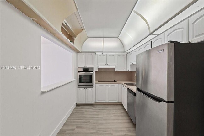 Building Photo - 19380 Collins Ave