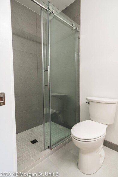 Remodeled bathroom with tile floors, walk in shower - 2090 NE Morgan St