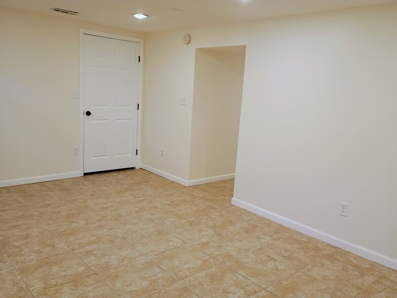 Basement Family Room - 10360 E Jewell Ave