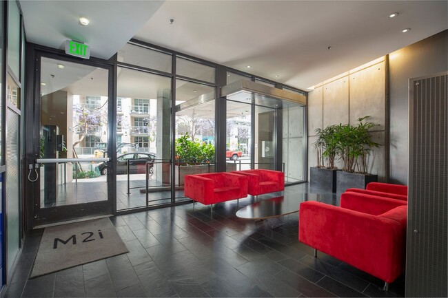 Building Photo - Modern Condo Retreat in the Vibrant M2i Co...